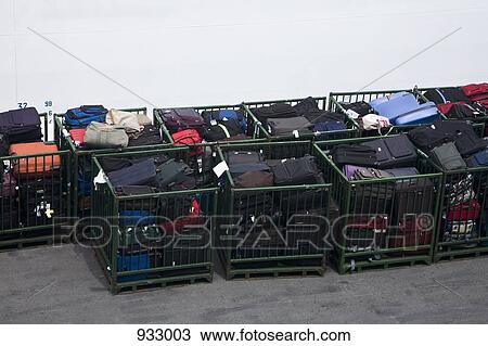 Luggage in storage cages View Large Photo Image Stock Image - Luggage in storage cages. Fotosearch