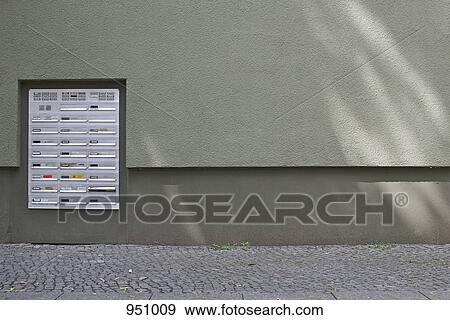 Mailboxes in the front courtyard of an apartment building View Large Photo Image Stock Photo - Mailboxes in the front courtyard of an apartment building. Fotosearch
