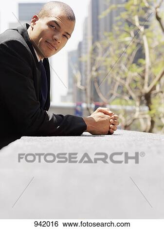 Portrait of a businessman View Large Photo Image Stock Photograph - Portrait of a businessman. Fotosearch