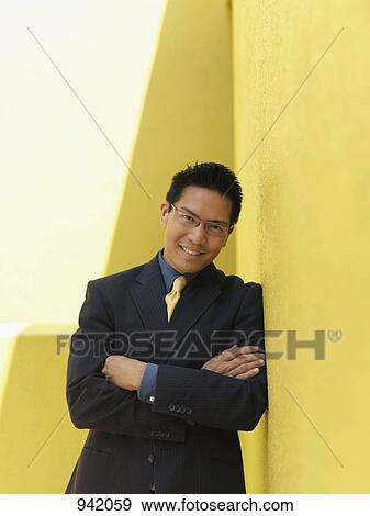 Stock Photo - Portrait of a cheerful businessman. Fotosearch