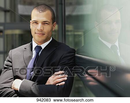 Stock Image - Portrait of a confident businessman. Fotosearch