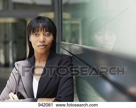 Stock Image - Portrait of a confident businesswoman. Fotosearch