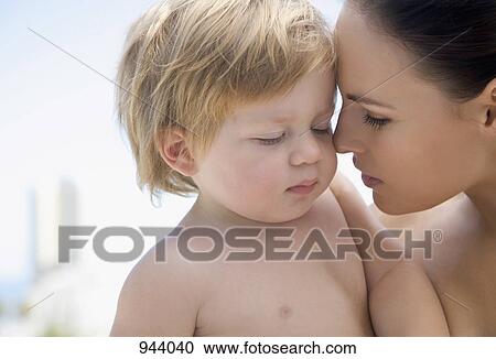 Stock Image - Portrait of a mother and son. Fotosearch