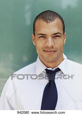 Portrait of a young businessman View Large Photo Image Stock Image - Portrait of a young businessman. Fotosearch