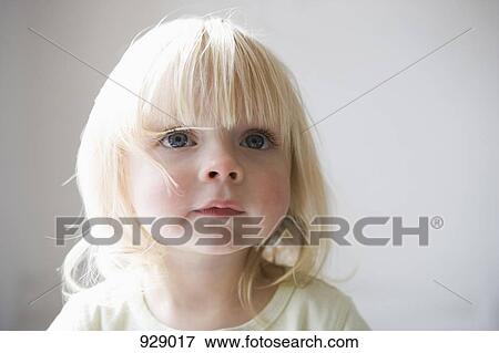 Portrait of a young girl View Large Photo Image Stock Photo - Portrait of a young girl. Fotosearch