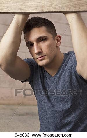 Stock Image - Portrait of a young man. Fotosearch