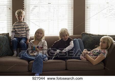 Picture - Portrait of four siblings. Fotosearch