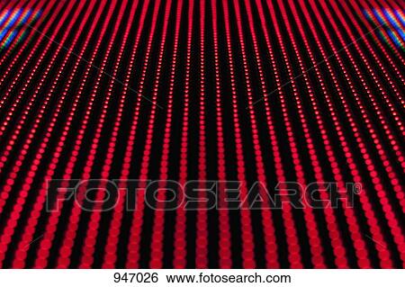 Stock Photograph - Red dot pattern, full frame. Fotosearch
