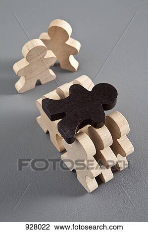 Six unpainted wooden stick figures carrying a brown wooden stick figure View Large Photo Image Stock Image - Six unpainted wooden stick figures carrying a brown wooden stick figure. Fotosearch