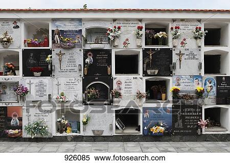 Stock Photography - Stacked tombs in a cemetery. Fotosearch