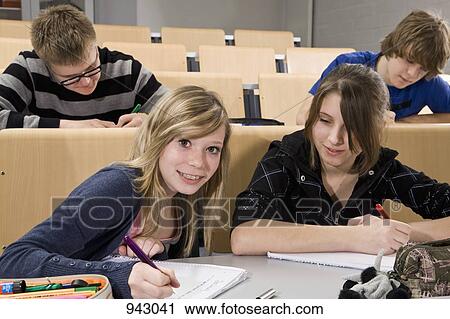 Stock Image - Students in a classroom. Fotosearch
