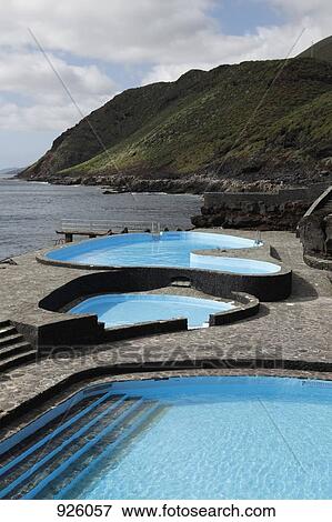 Swimming pools next to the sea View Large Photo Image Stock Photo - Swimming pools next to the sea. Fotosearch