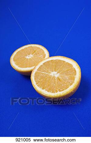 Two orange halves View Large Photo Image Stock Photography - Two orange halves. Fotosearch