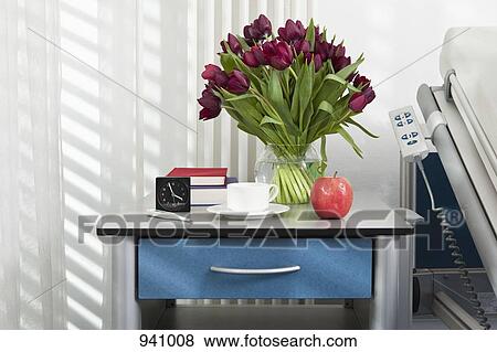 Various objects on a bedside table in a hospital ward View Large Photo Image Stock Photo - Various objects on a bedside table in a hospital ward. Fotosearch