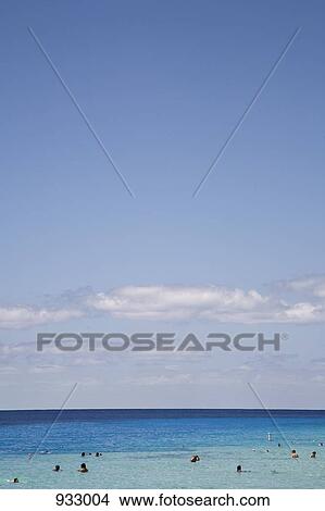 View of people swimming in the sea View Large Photo Image Picture - View of people swimming in the sea. Fotosearch