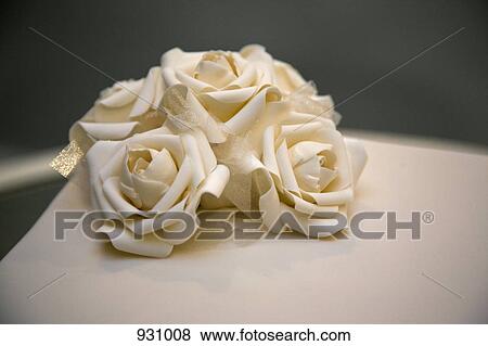 White chocolate roses on a cake View Large Photo Image Stock Photo - White chocolate roses on a cake. Fotosearch