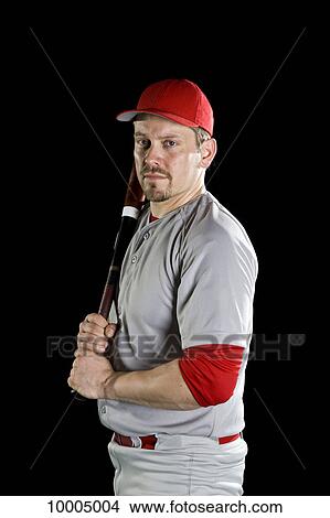 A baseball player, portrait, studio shot View Large Photo Image Picture - A baseball player, portrait, studio shot. Fotosearch