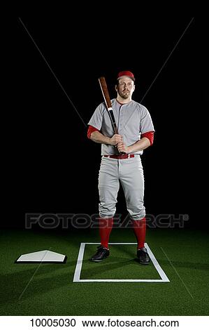 A baseball player, portrait, studio shot View Large Photo Image Stock Image - A baseball player, portrait, studio shot. Fotosearch