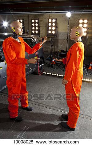 A crash test dummy holding keys out to another crash test dummy View Large Photo Image Stock Photography - A crash test dummy holding keys out to another crash test dummy. Fotosearch