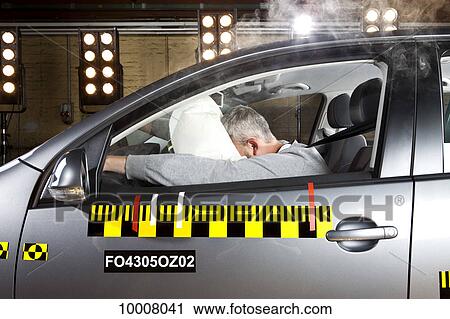 A man's face impacting an airbag in a crash test car View Large Photo Image Stock Image - A man's face impacting an airbag in a crash test car. Fotosearch