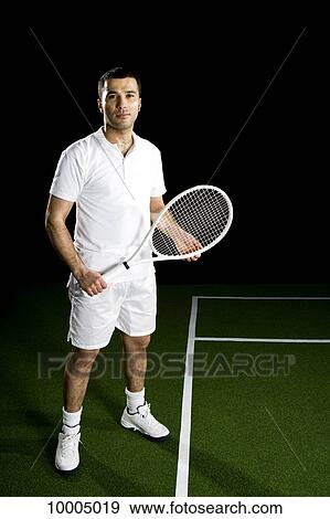 A tennis player, portrait, studio shot View Large Photo Image Stock Photo - A tennis player, portrait, studio shot. Fotosearch