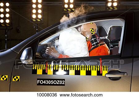 An airbag deploying during a crash test View Large Photo Image Stock Photograph - An airbag deploying during a crash test. Fotosearch