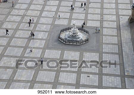 People walking through Gendarmenmarkt, Berlin, Germany View Large Photo Image Stock Image - People walking through Gendarmenmarkt, Berlin, Germany. Fotosearch