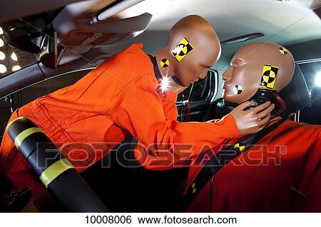 Two crash test dummies about to kiss inside a car View Large Photo Image Stock Photograph - Two crash test dummies about to kiss inside a car. Fotosearch