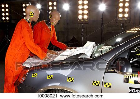 Two crash test dummies looking at a road map View Large Photo Image Stock Image - Two crash test dummies looking at a road map . Fotosearch