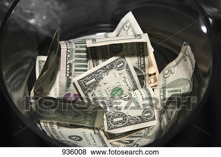 US bank notes in a container View Large Photo Image Stock Photo - US bank notes in a container. Fotosearch