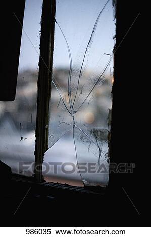 A broken window pane View Large Photo Image Stock Photography - A broken window pane. Fotosearch