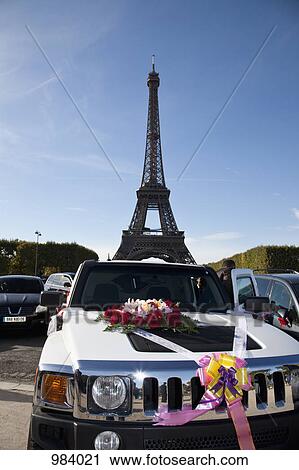 A car decorated with flowers and ribbons in front of the Eiffel Tower View Large Photo Image Stock Image - A car decorated with flowers and ribbons in front of the Eiffel Tower. Fotosearch