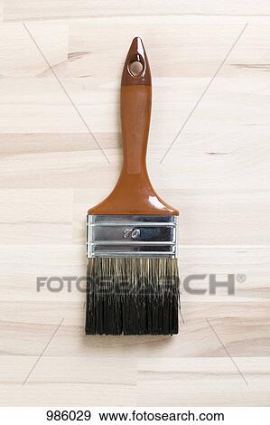 A clean paintbrush on unpainted wood View Large Photo Image Stock Photo - A clean paintbrush on unpainted wood. Fotosearch