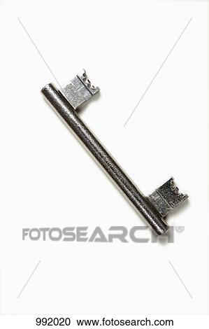 A double-ended key, white background View Large Photo Image Stock Image - A double-ended key, white background. Fotosearch