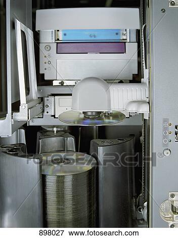 A DVD burning machine View Large Photo Image Stock Photo - A DVD burning machine. Fotosearch