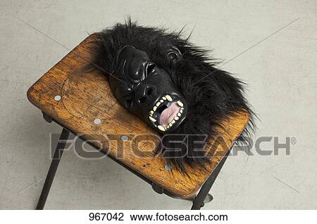 A fancy dress mask lying on a stool View Large Photo Image Stock Image - A fancy dress mask lying on a stool. Fotosearch