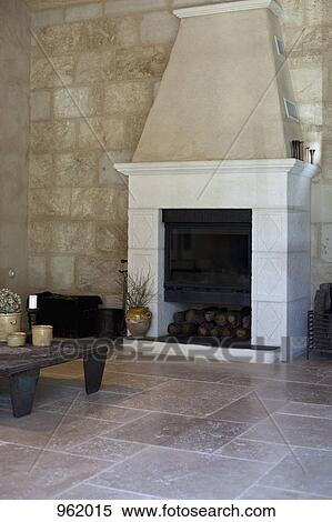 A fireplace in a living room View Large Photo Image Stock Photography - A fireplace in a living room. Fotosearch