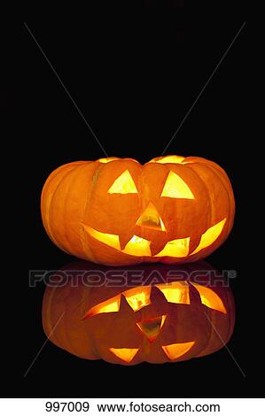 A glowing jack-o-lantern View Large Photo Image Stock Photo - A glowing jack-o-lantern. Fotosearch