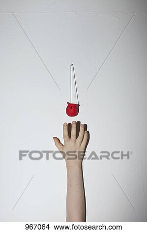 A hand reaching up a wall for a clown's nose View Large Photo Image Picture - A hand reaching up a wall for a clown's nose. Fotosearch