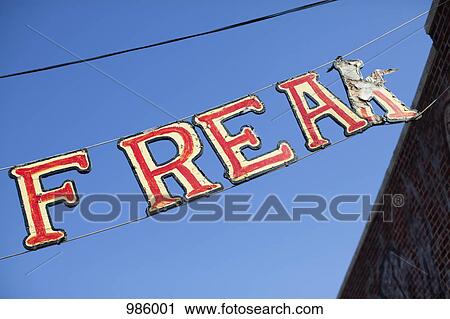 A hanging banner side reading FREAK View Large Photo Image Stock Image - A hanging banner side reading FREAK. Fotosearch