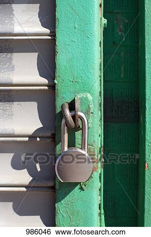 A locked padlock, close-up View Large Photo Image Stock Photograph - A locked padlock, close-up. Fotosearch