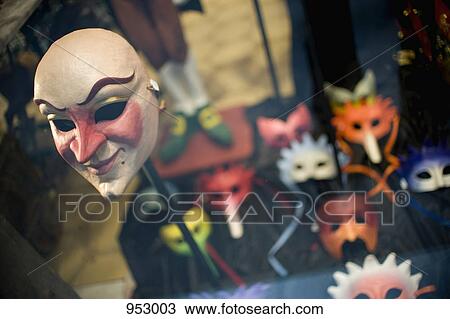 A masquerade mask in a window display View Large Photo Image Stock Image - A masquerade mask in a window display. Fotosearch