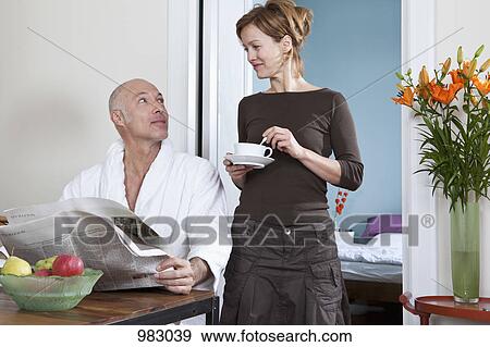 Stock Photo - A mature couple in the morning. Fotosearch
