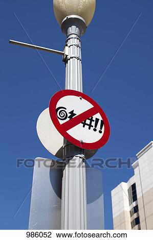 A no swearing sign posted on a street light View Large Photo Image Stock Image - A no swearing sign posted on a street light. Fotosearch