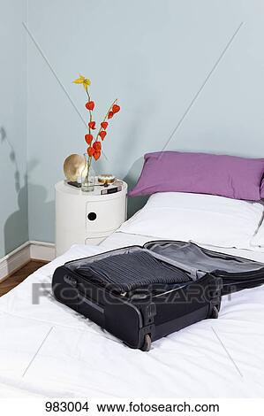 A packed suitcase View Large Photo Image Picture - A packed suitcase. Fotosearch