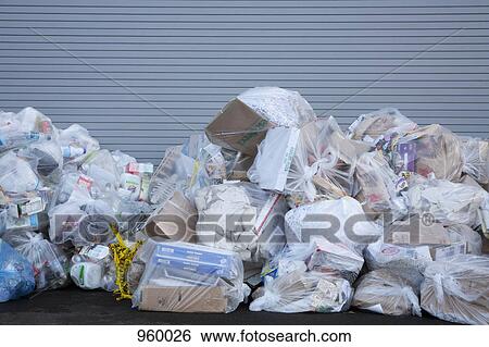 Stock Photograph - A pile of garbage bags. Fotosearch