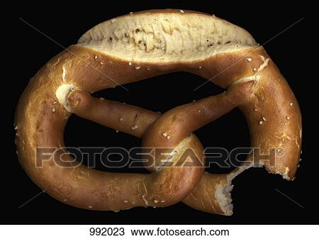 A pretzel with a missing bite, directly below View Large Photo Image Stock Image - A pretzel with a missing bite, directly below. Fotosearch