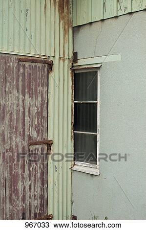 Stock Image - A run down facade of a building. Fotosearch