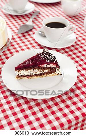 A slice of cake and cup of coffee View Large Photo Image Stock Image - A slice of cake and cup of coffee. Fotosearch