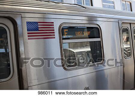 A subway train stopped at the station, New York, USA View Large Photo Image Stock Image - A subway train stopped at the station, New York, USA. Fotosearch